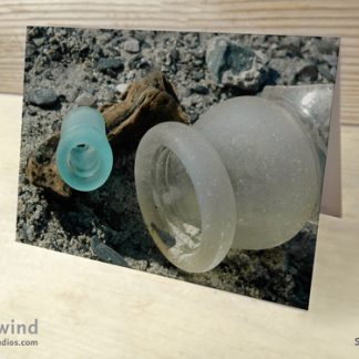 white and teal Sea glass bottle neck and drift wood